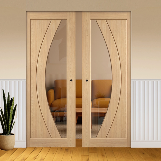 Girona Oak Clear Glazed Double Flush Pocket Door Set