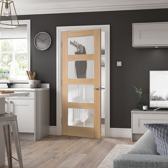 Contemporary 4L Clear Glazed Oak Door Fully Finished